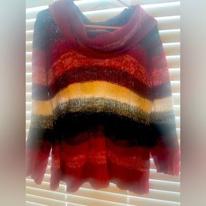 Canyon River Blues sweater. Very comfortable. Knitted. Had front pockets.